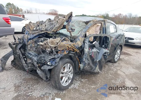 2018 Toyota Yaris Ia из США, поврежденный, VIN 3MYDLBYV1JY315936